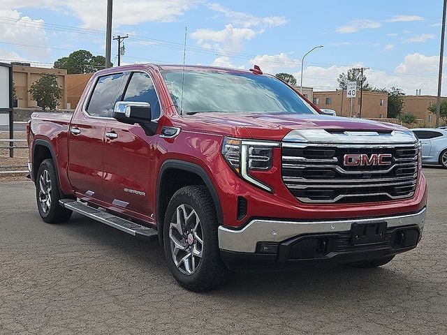 2024 GMC Sierra 1500 SLT in Volcanic Red Tintcoat — front three-quarter view